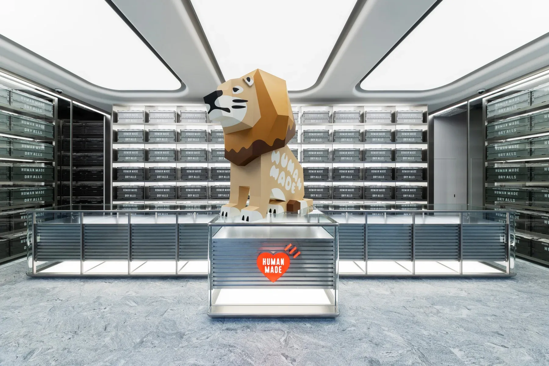 The lion figure and glass cases inside HUMAN MADE TOKYO