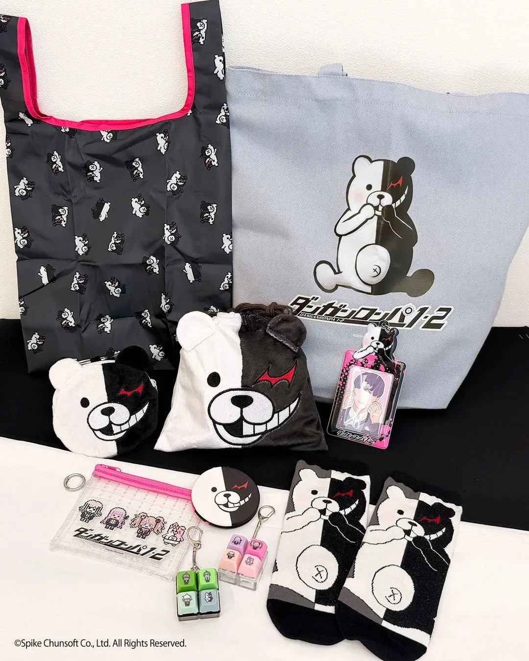 Danganronpa 1-2 Reload Monokuma pouches, tote bag, socks and keycap keychains from Thank You Mart