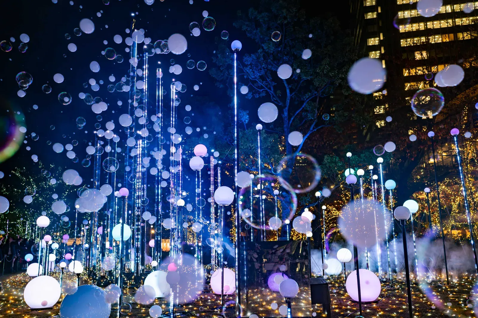 Lit poles and bubbles on the Midtown Garden lawn at MIDTOWN CHRISTMAS last season